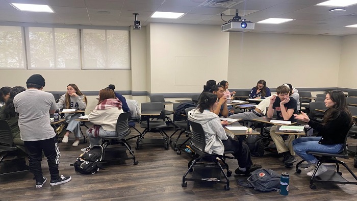 Students working in groups in a classroom